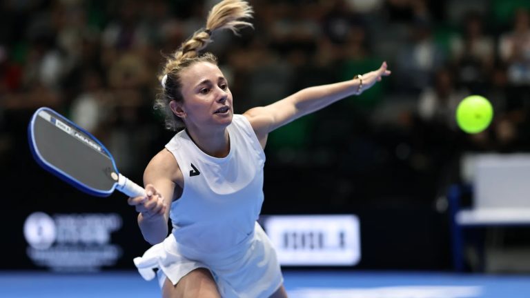 Andie Dikosavljevic stretches for a forehand during the Hong Kong Slam women's singles final at Kai Tak Arena