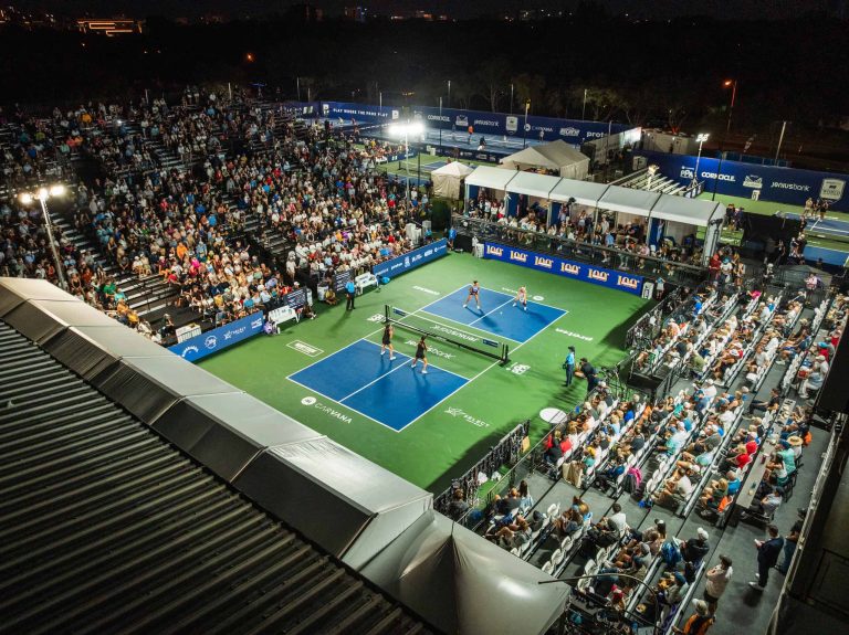 Aerial view of a packed stadium court at night at Brookhaven Country Club during the 2025 pickleball World Championships