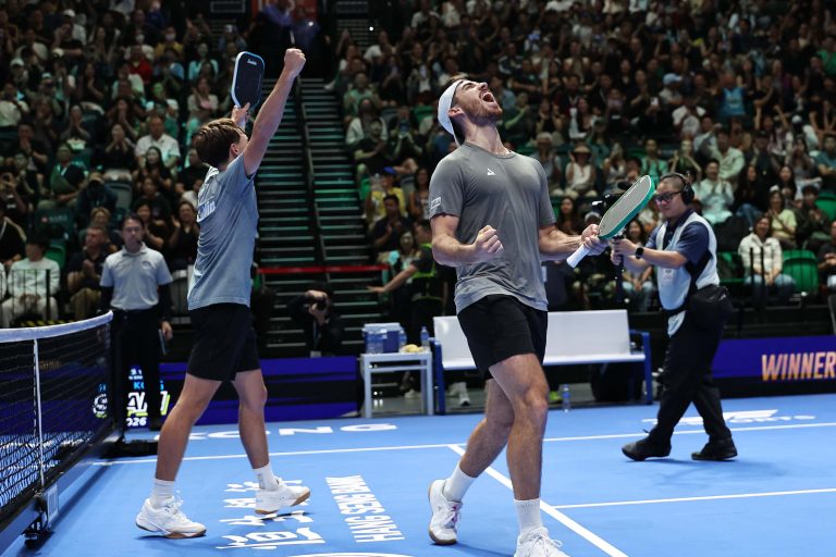 Federico Staksrud and Hayden Patriquin celebrate winning the men's doubles final at the Hong Kong Slam 2026, Kai Tak Arena