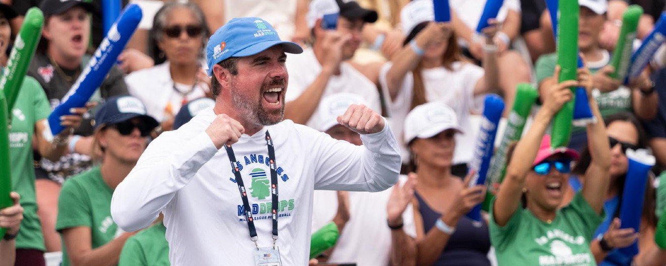 Chris Cantino, Europe–West captain at the MLP Nations Cup 2026, celebrating courtside in a Los Angeles Mad Drops shirt